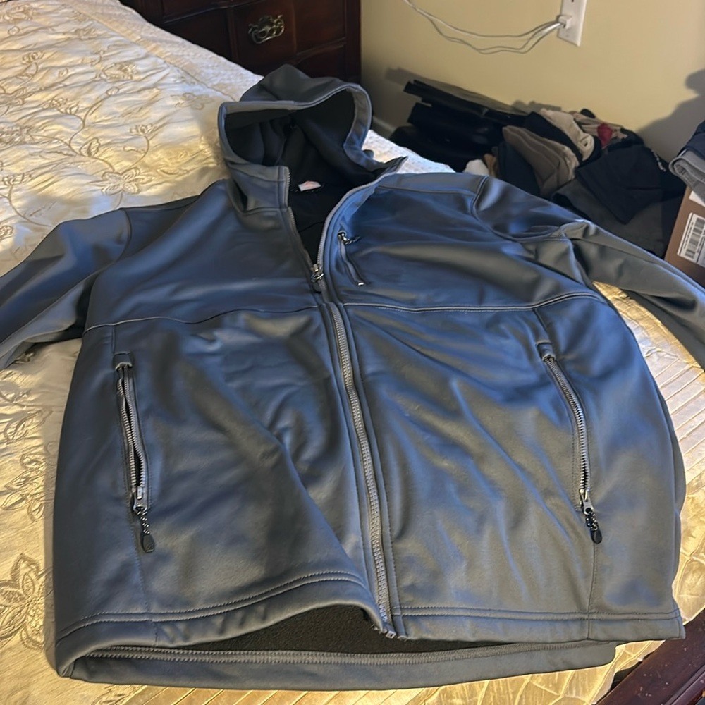 Large NWOT gray weatherproof jacket with hood 3 zipper pockets zipper closure